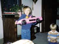 Julie with a Barbie convertible