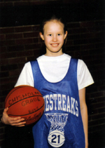 Julie in her grade school basketball jersey